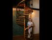 Винтовая лестница с кованными элементами